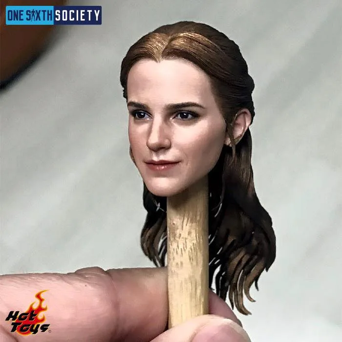 Belle's painted head sculpt on a wooden support, showing brown swept-back hair, a slight smile and small earrings.