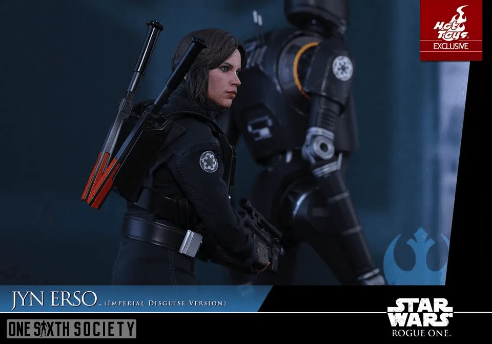 Side view of Jyn Erso in black Imperial clothing with red-tipped signaling batons on her back and K-2SO in the background.