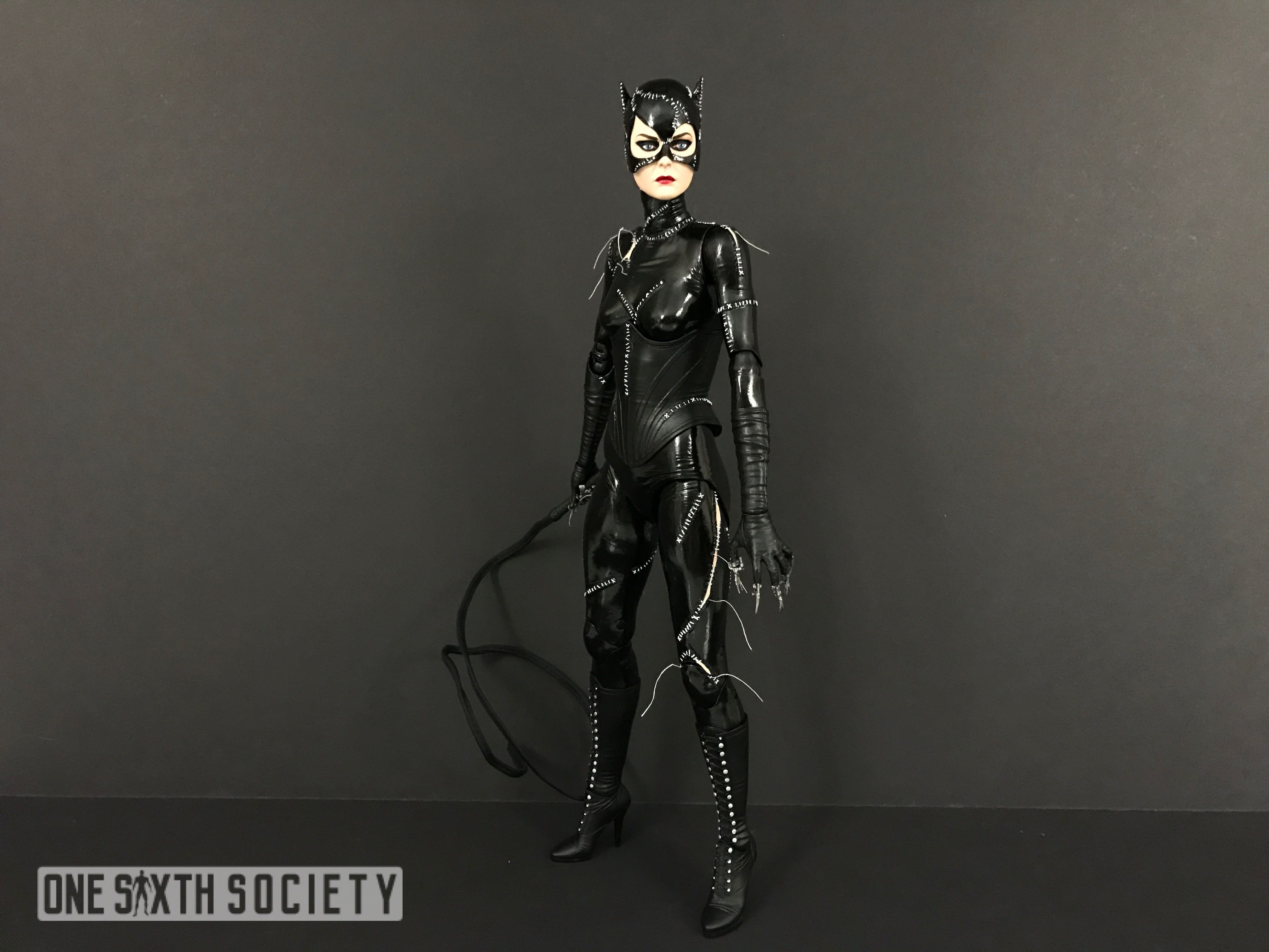 NECA's Catwoman comes with some nice accessories! A taser and a whip!