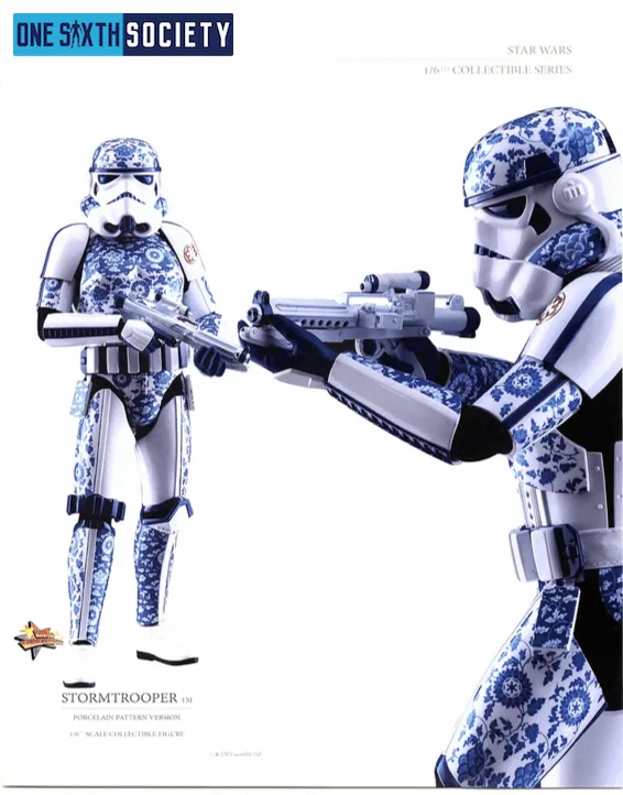 Hot Toys Stormtrooper with blue-and-white porcelain-style armor patterns, shown standing and aiming a blaster in close-up.