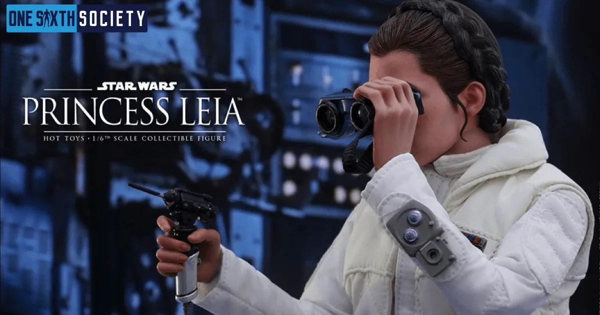 Princess Leia figure holding binoculars to her eyes with one hand and a blaster in the other, wearing her white Hoth outfit.