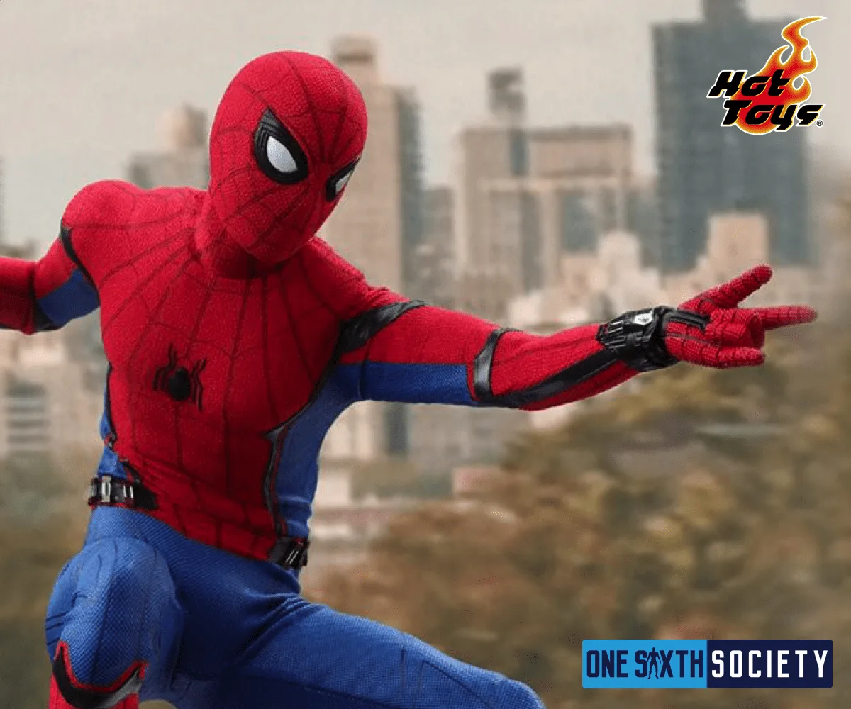 Hot Toys Spider-Man extending one arm with fingers posed to shoot a web, showing the black wrist detail on his red-and-blue suit.