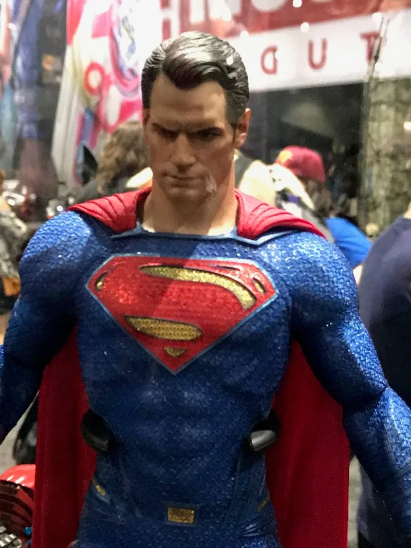 Hot Toys Superman portrait showing a textured blue suit, red cape and large red-and-gold chest emblem.
