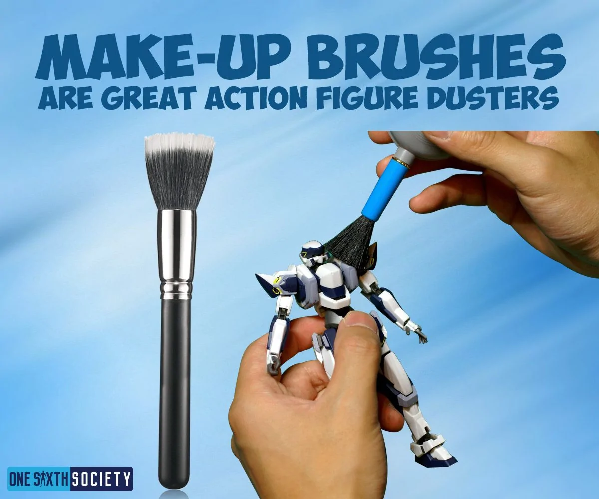 Figure-cleaning artwork showing a large soft brush beside hands gently brushing a small white-and-blue robot figure.
