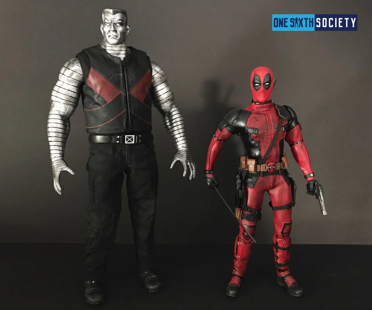 Tall silver Colossus figure standing beside a smaller Hot Toys Deadpool figure in a red-and-black suit.