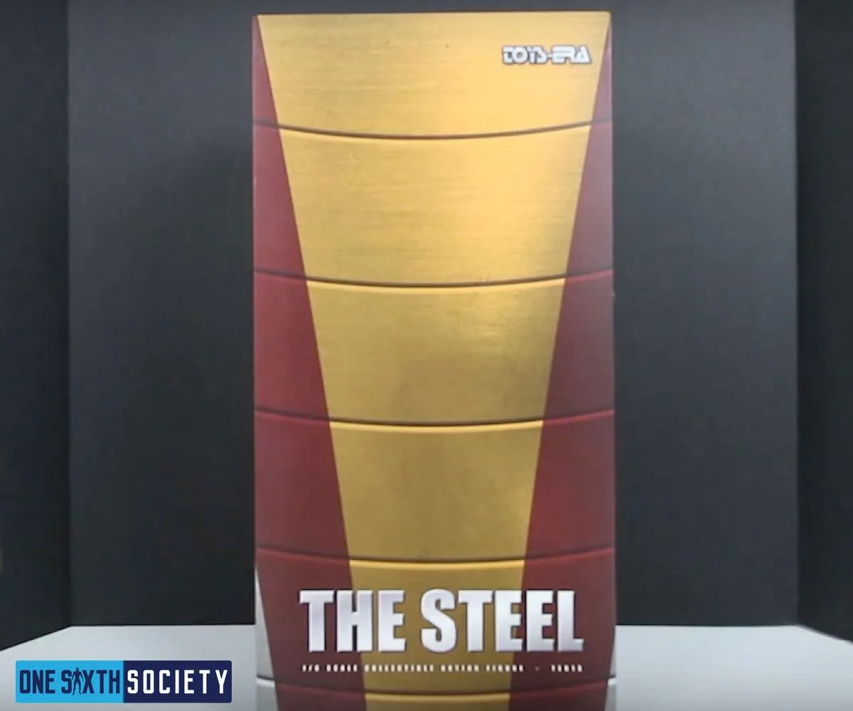 Tall burgundy and gold Toys Era figure box with The Steel lettering on its front.