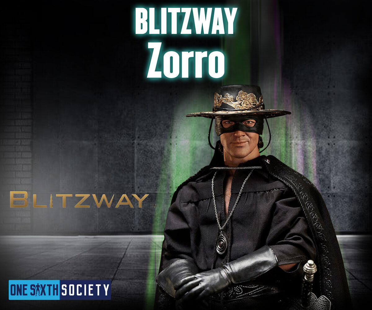 Blitzway Zorro figure wearing a black eye mask, decorated hat, cape and gloves, with a sword hilt visible at his side.