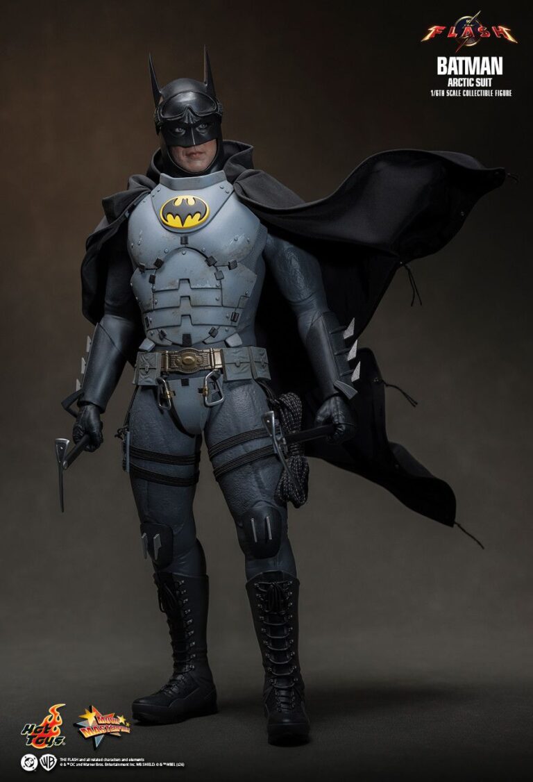Full view of Batman in the Arctic Suit with the wired black cape spread behind him.