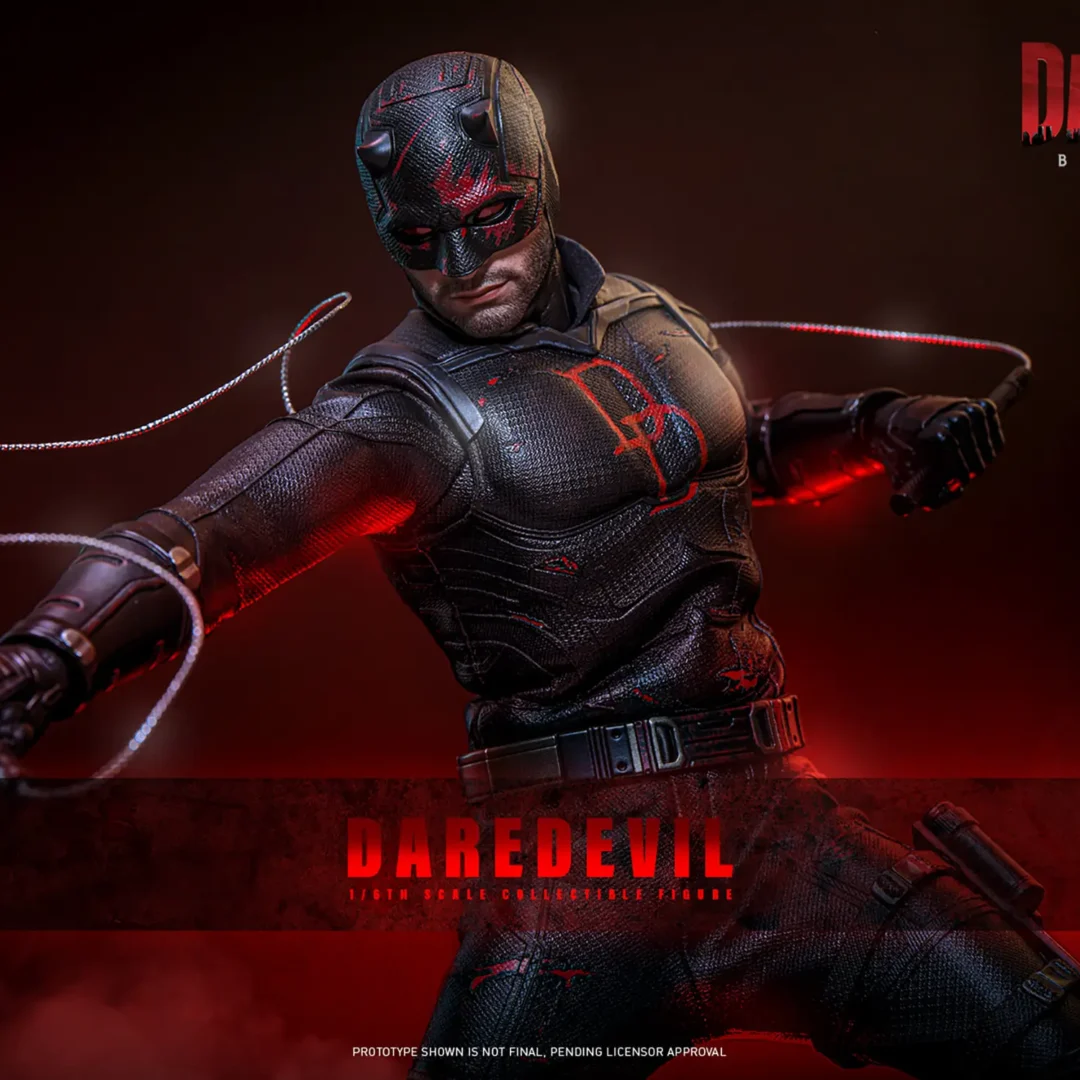 Hot Toys Daredevil swinging wire-linked Billy Clubs across a weathered black suit, with red mask markings and the red DD chest emblem under dramatic red light.