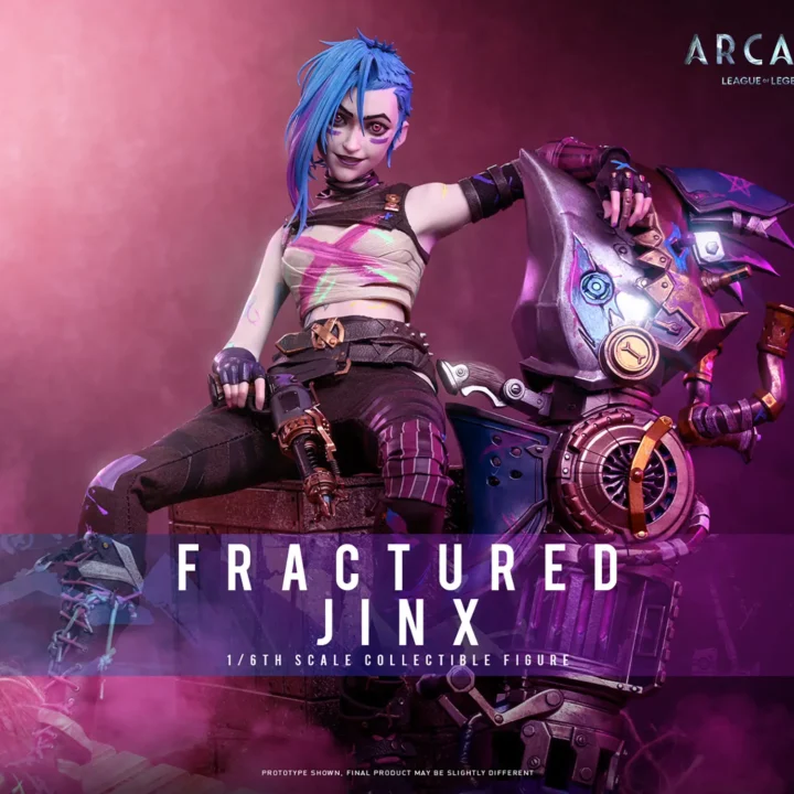 Hot Toys Fractured Jinx sitting beside her oversized Rhino Gun with one hand resting on its shark-like casing, showing blue side-swept hair and a painted crop top.