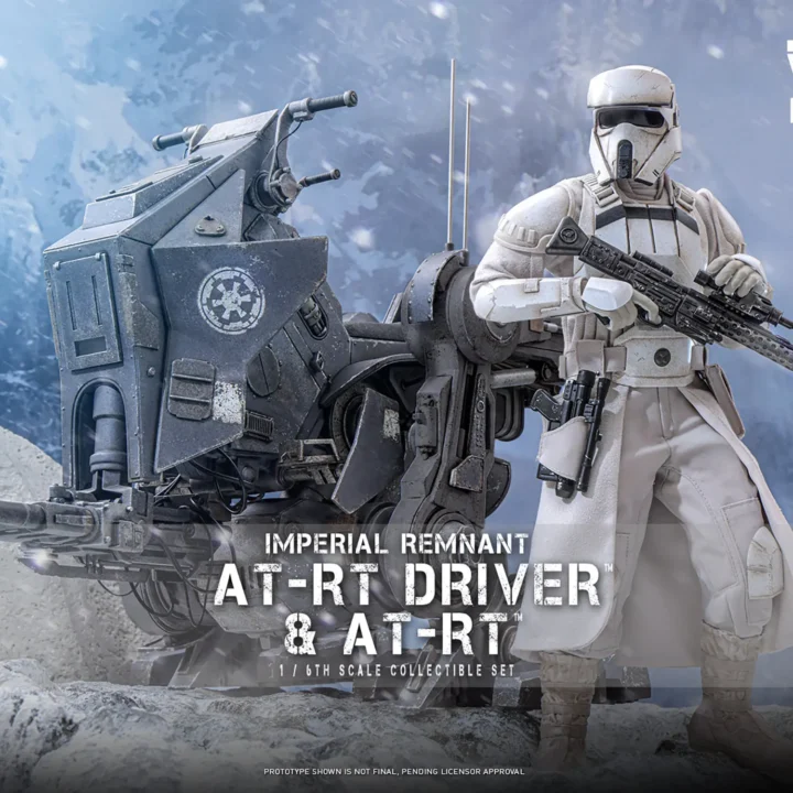 Hot Toys Imperial Remnant AT-RT Driver holding a long blaster rifle beside the folded gray walker in a staged snowy mountain scene.