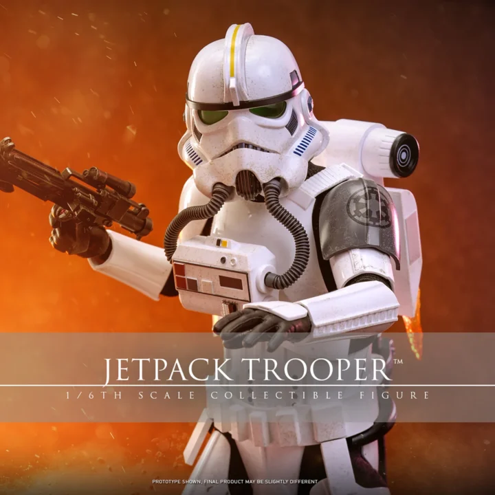 Hot Toys Jetpack Trooper holding an E-11 blaster outward, with weathered white armor, green helmet lenses, breathing hoses and a dark Imperial shoulder plate.