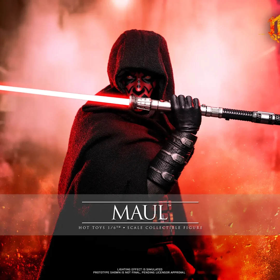 Hot Toys Maul beneath a black hood holding a red double-bladed lightsaber horizontally before his face, surrounded by fiery red light.