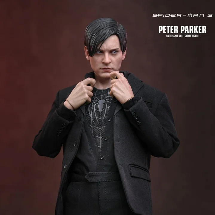Peter Parker MMS891 figure opening his black shirt to reveal the Spider-Man suit underneath.