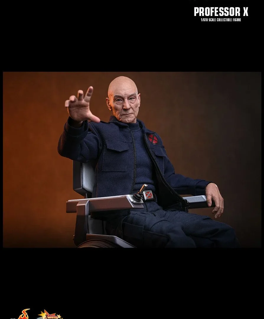 Wide portrait of Professor X extending an open hand from his wheelchair, his jacket partly open over the X-Men belt buckle against an orange background.