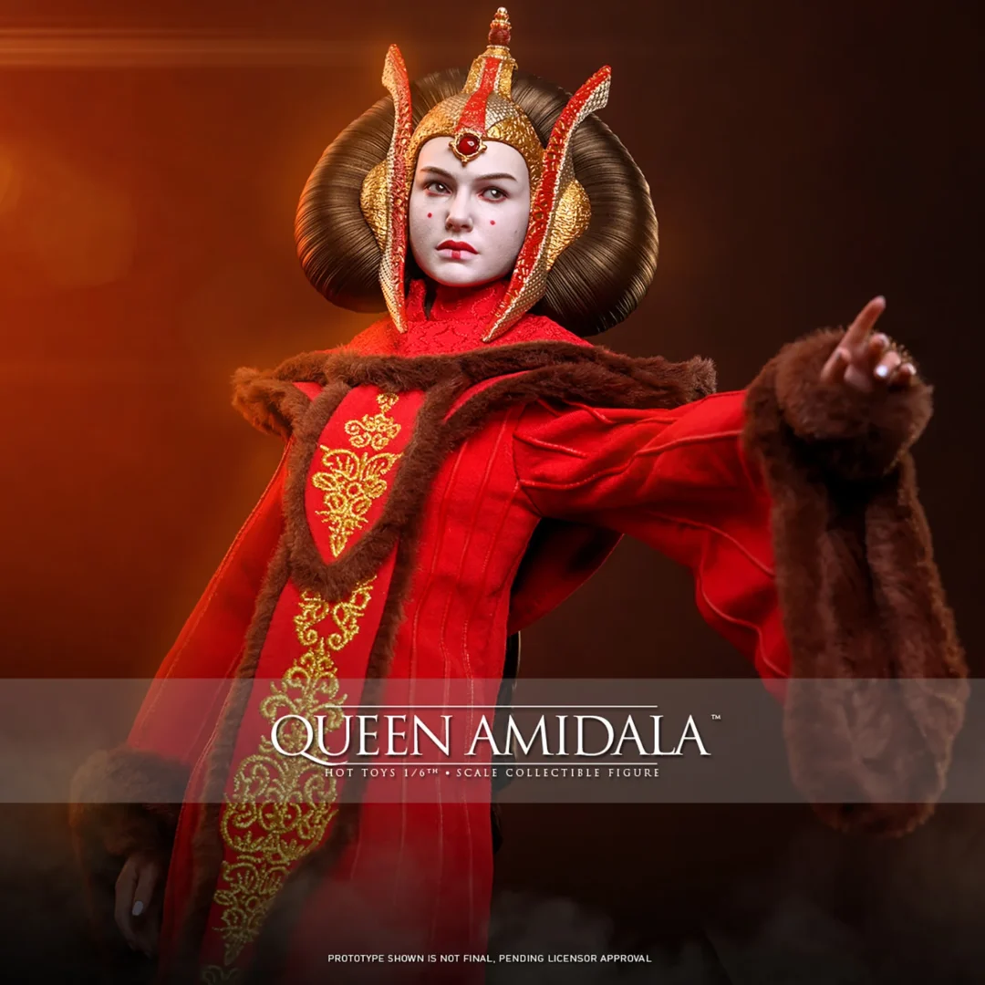 Hot Toys Queen Amidala extending one hand in her red throne-room gown, with gold embroidery, dark faux-fur trim and an ornate gold-and-red headdress.