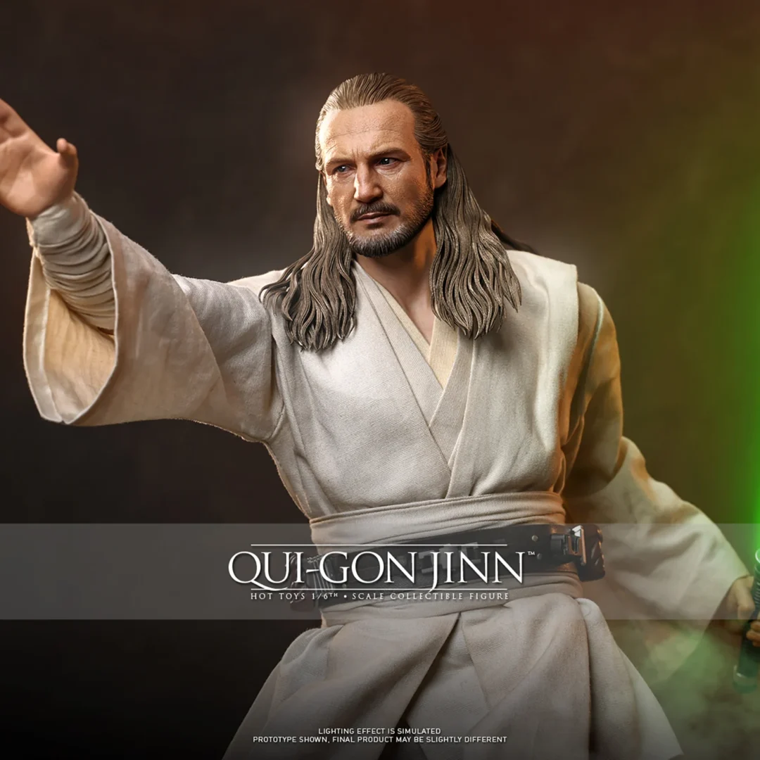 Hot Toys Qui-Gon Jinn extending an open hand in a Force gesture while holding a green lightsaber beside his beige Jedi tunic.
