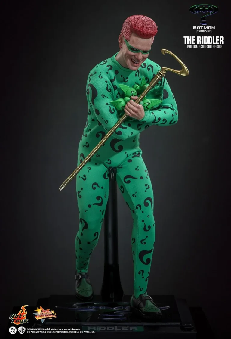Full-body Riddler figure leaning over his gold-colored question-mark cane