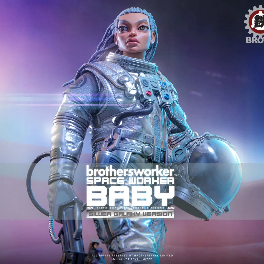Hot Toys Space Worker Baby in a reflective silver spacesuit, carrying a round helmet beside gray cotton hair, a chest control module and a dark mechanical tool.