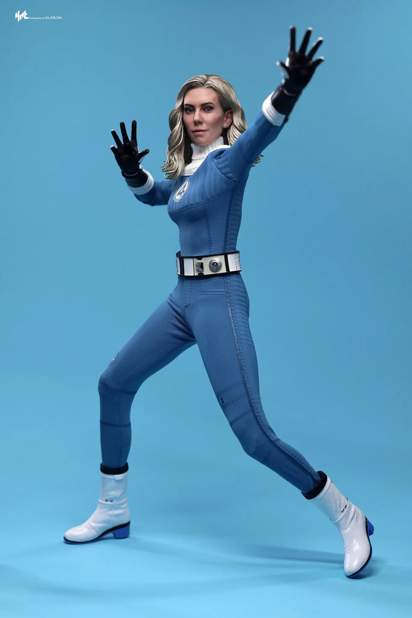 Final production review photo of Hot Toys Invisible Woman showing Sue with both arms raised in a power pose.