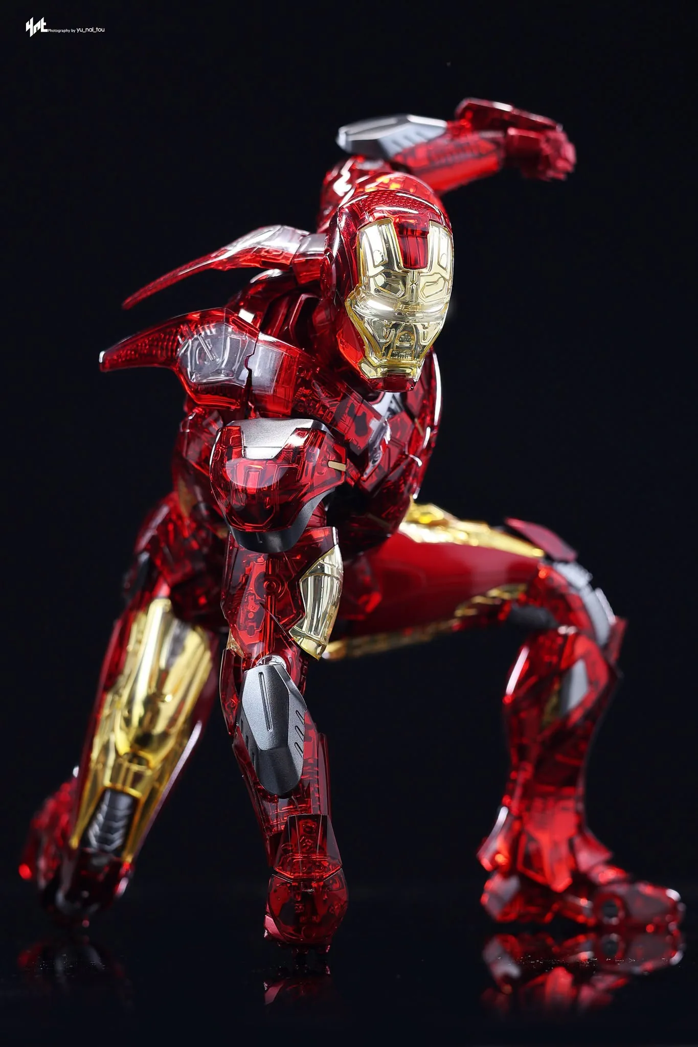 Final production review photo of Hot Toys Iron Man MK 7 Exo-Chrome showing the clear-armored figure in a kneeling pose.