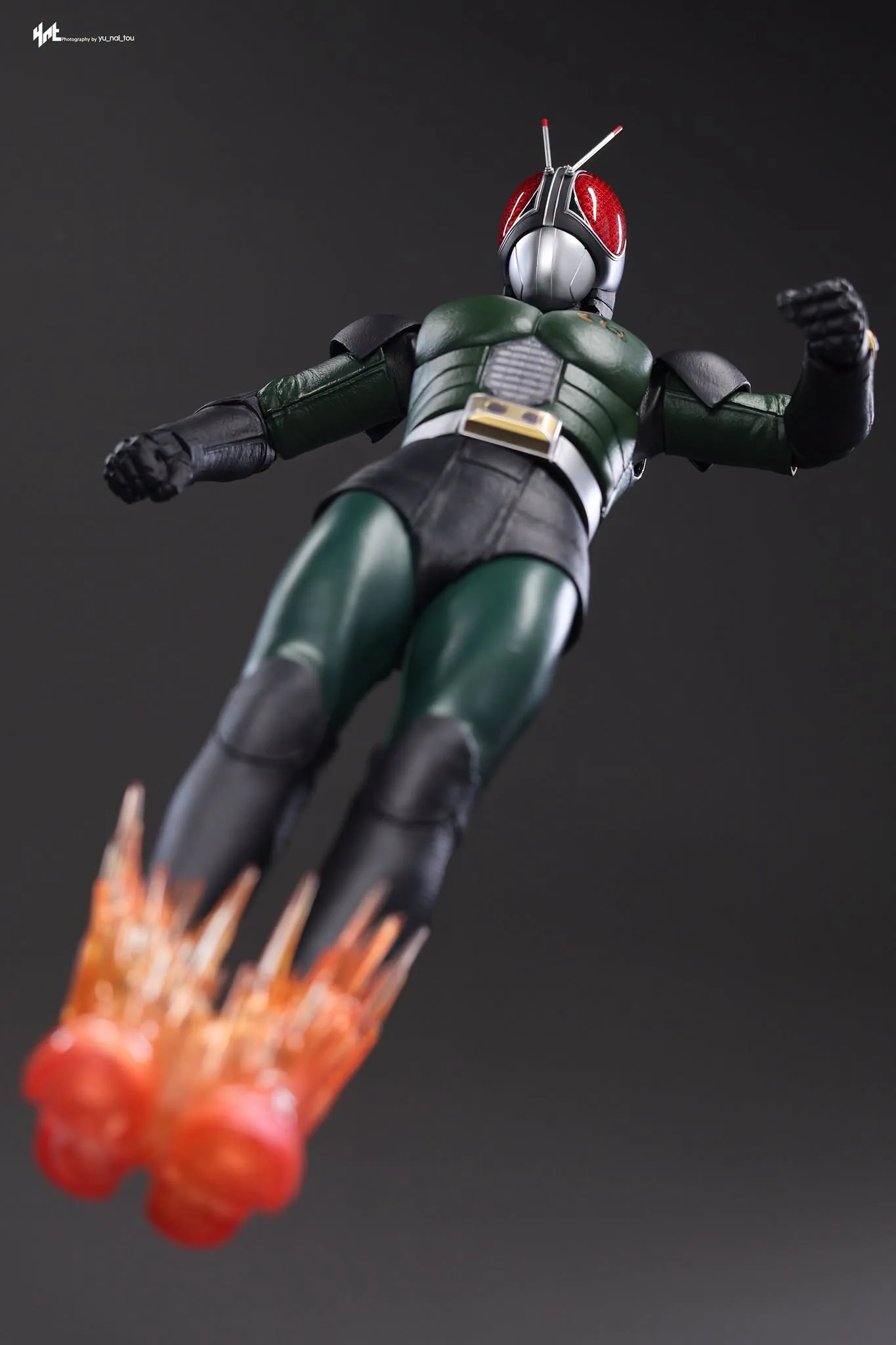 Final production review photo of Hot Toys Kamen Rider Black RX showing the airborne RX Kick pose and foot effects.