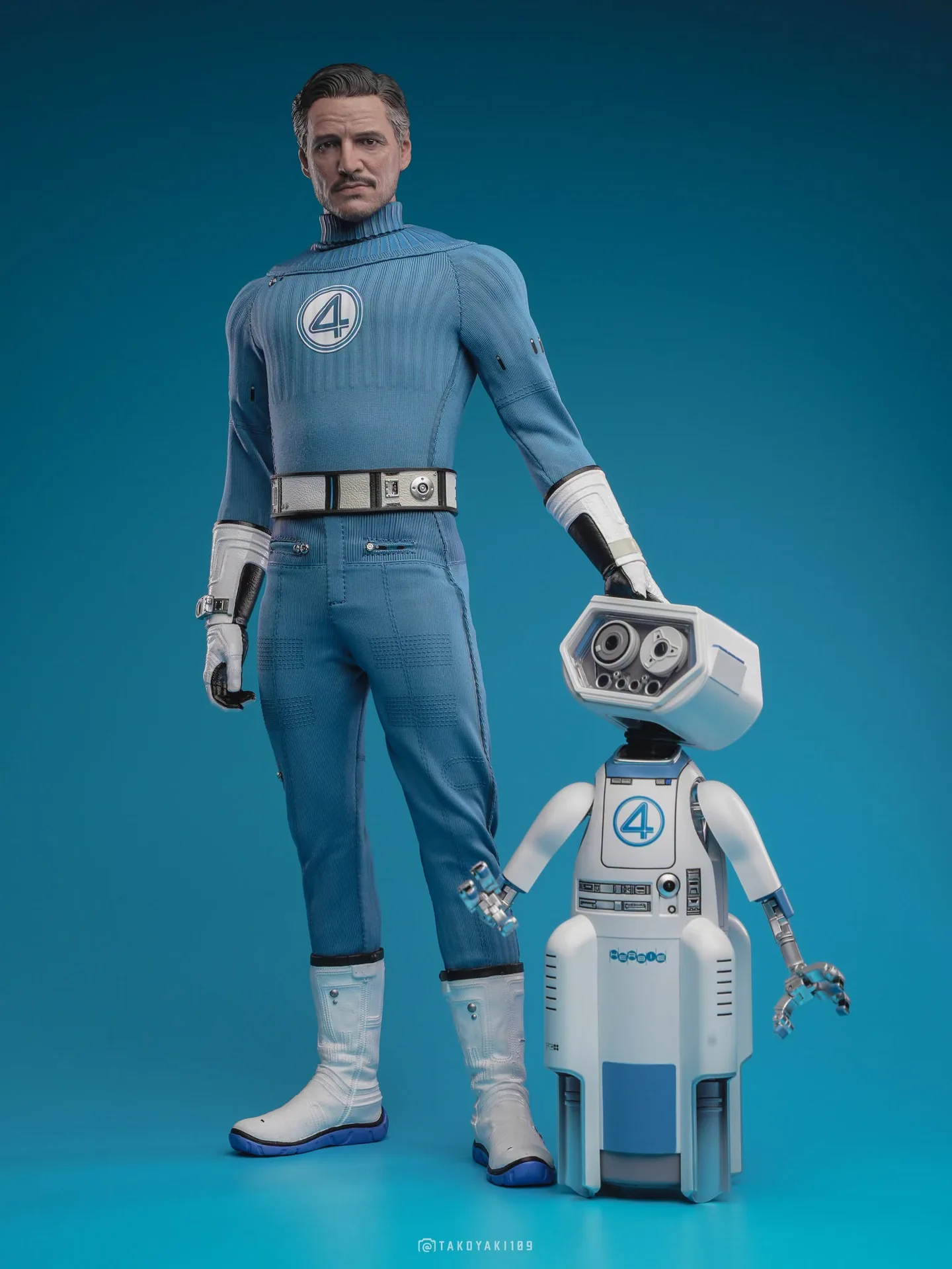 Final production review photo of Hot Toys Mister Fantastic showing Reed standing with the included H.E.R.B.I.E. robot.
